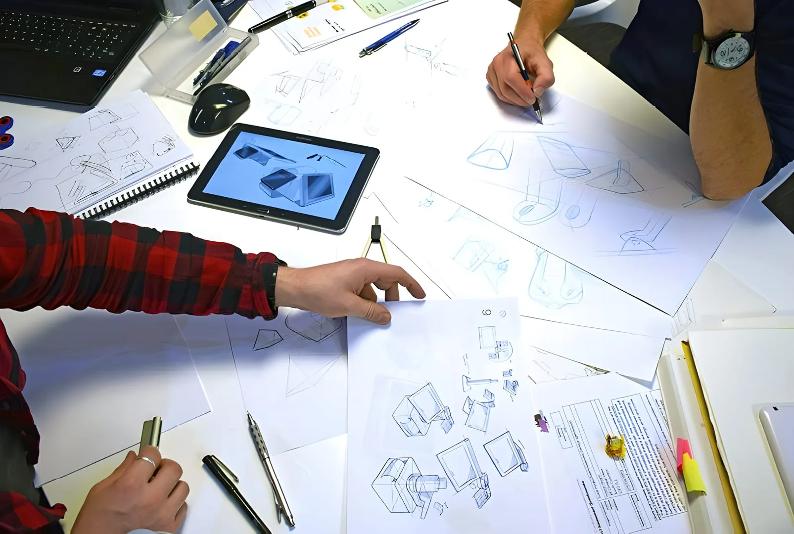 Sketching product concepts alongside CAD renders on a tablet